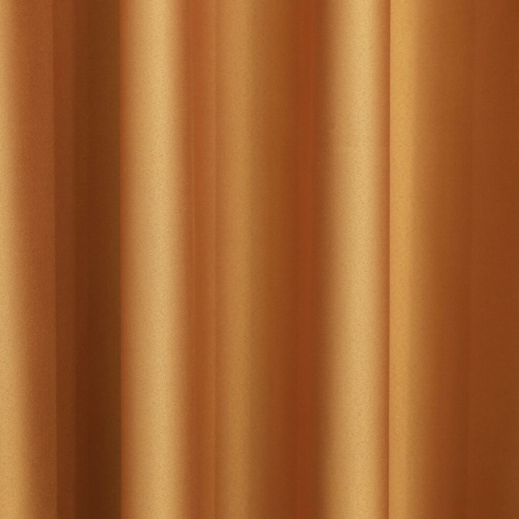 Imperial gold silk brocade fabric with lustrous woven finish for festive and couture wear
