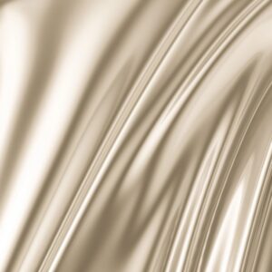 Luxurious golden shiny silk draped with soft smooth folds.