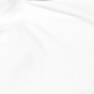 shot of a white fabric surface with a gentle horizontal fold and soft ripples.