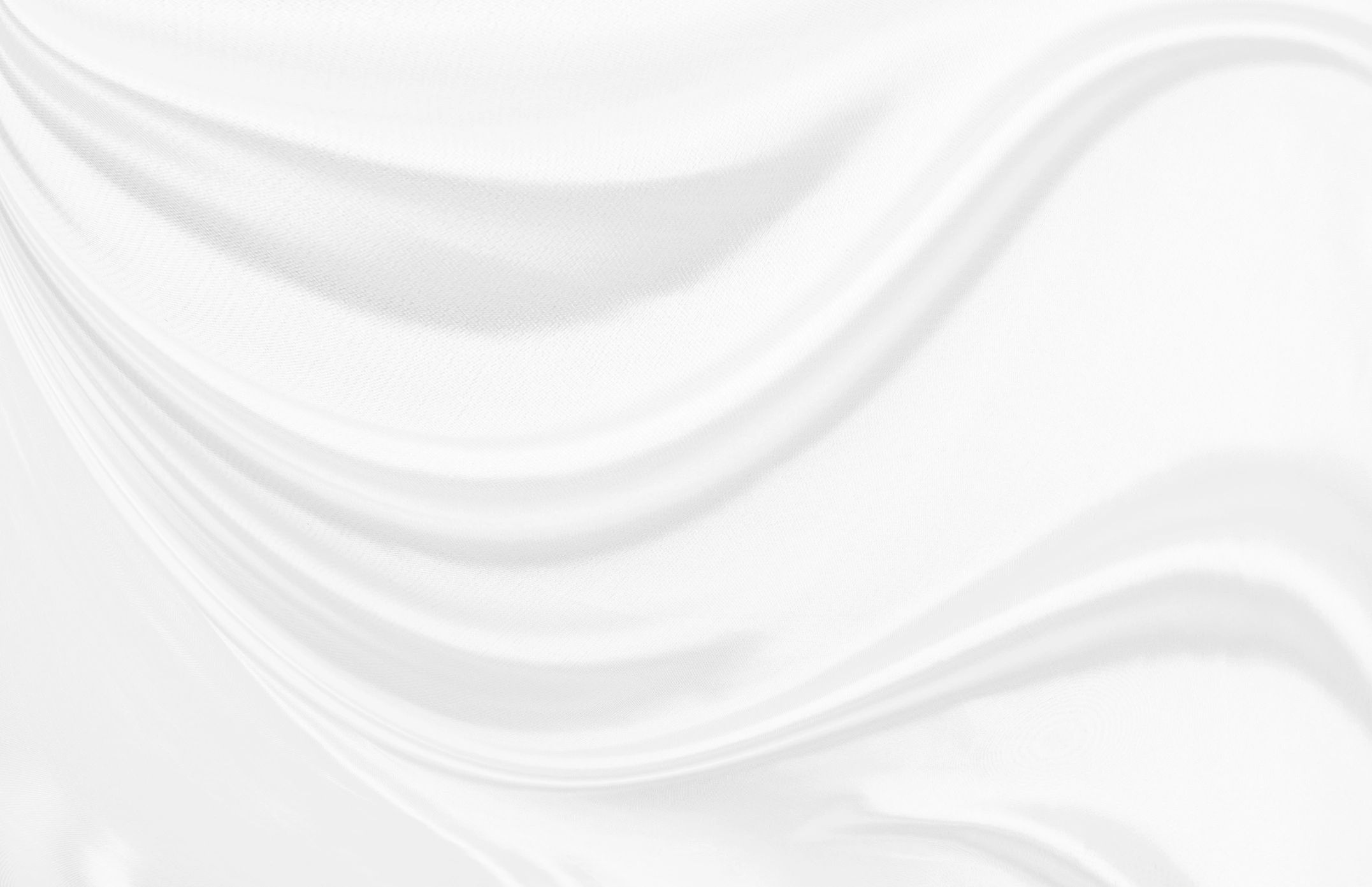 White gray satin texture that is white silver fabric silk background with beautiful soft blur pattern natural.