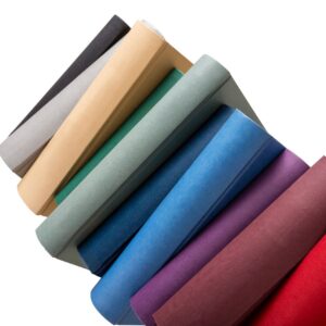Premium fabric rolls arranged in a textile showroom